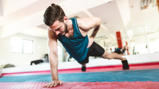 How to master a one-arm push-up in 4 easy steps